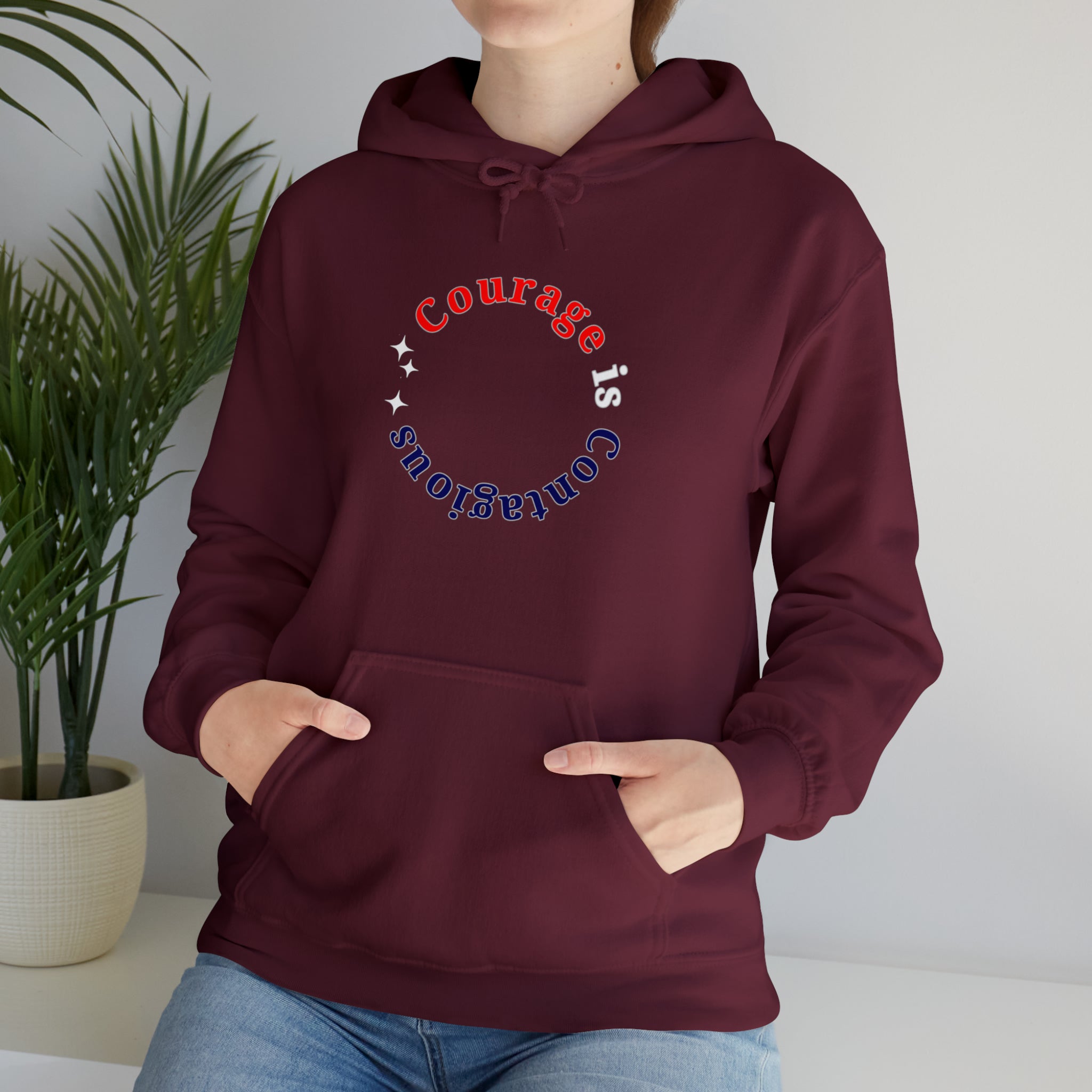 Adult unisex maroon hoodie " Courage is Contagious" inspired message on front.
