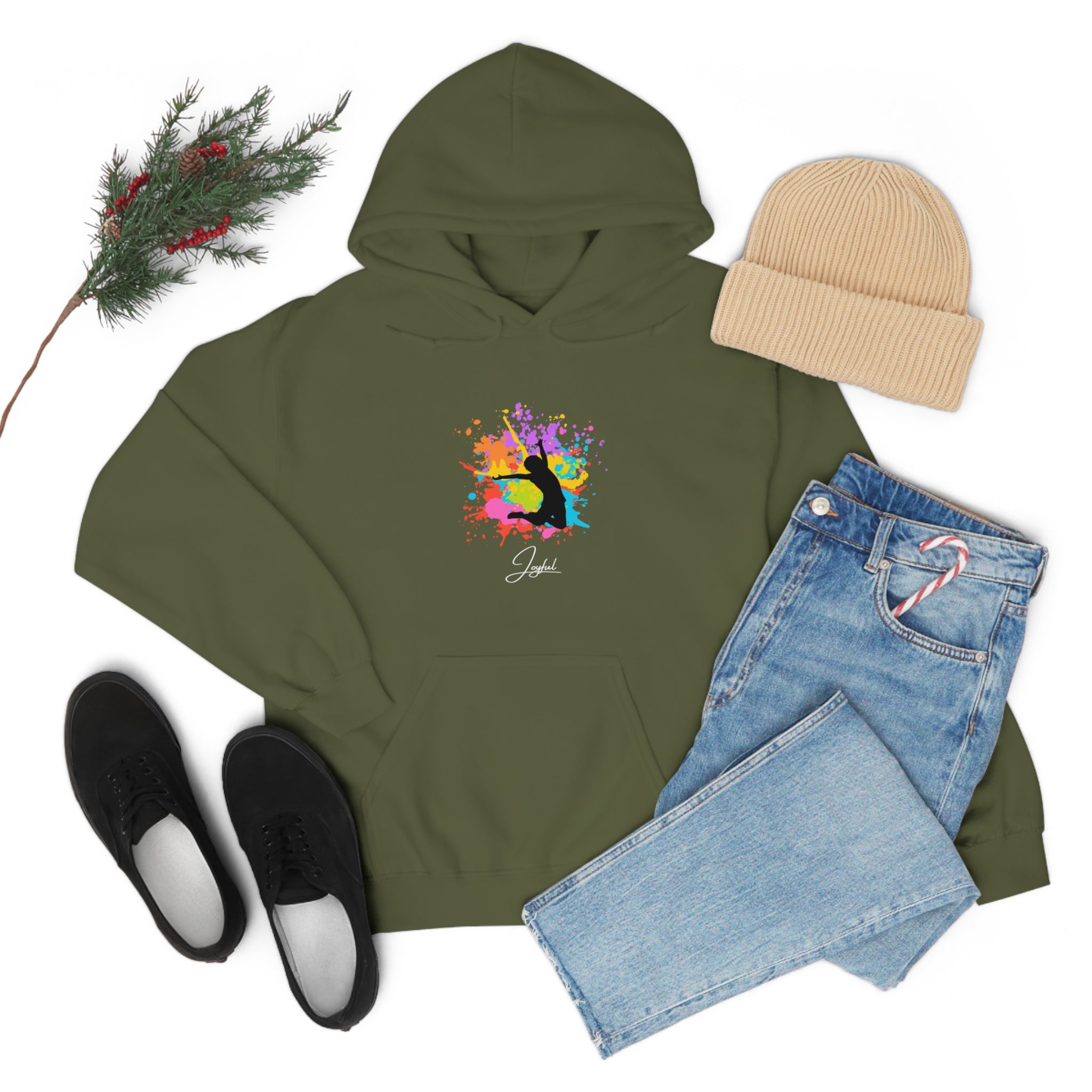 Adult outfit display with military green hoodie with "Joyful " graphic on front, black shoes, blue jeans, tan hat .