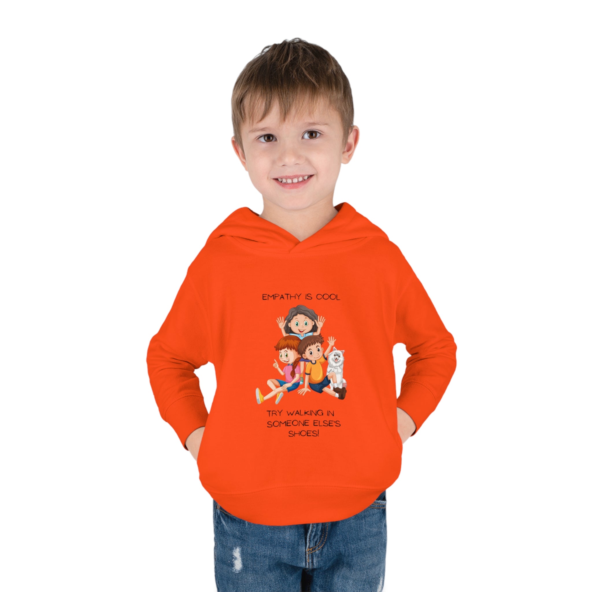 Toddler boy wearing orange hoodie " Empathy Is Cool Try Walking In Someone Else's Shoes" Inspired message on front.