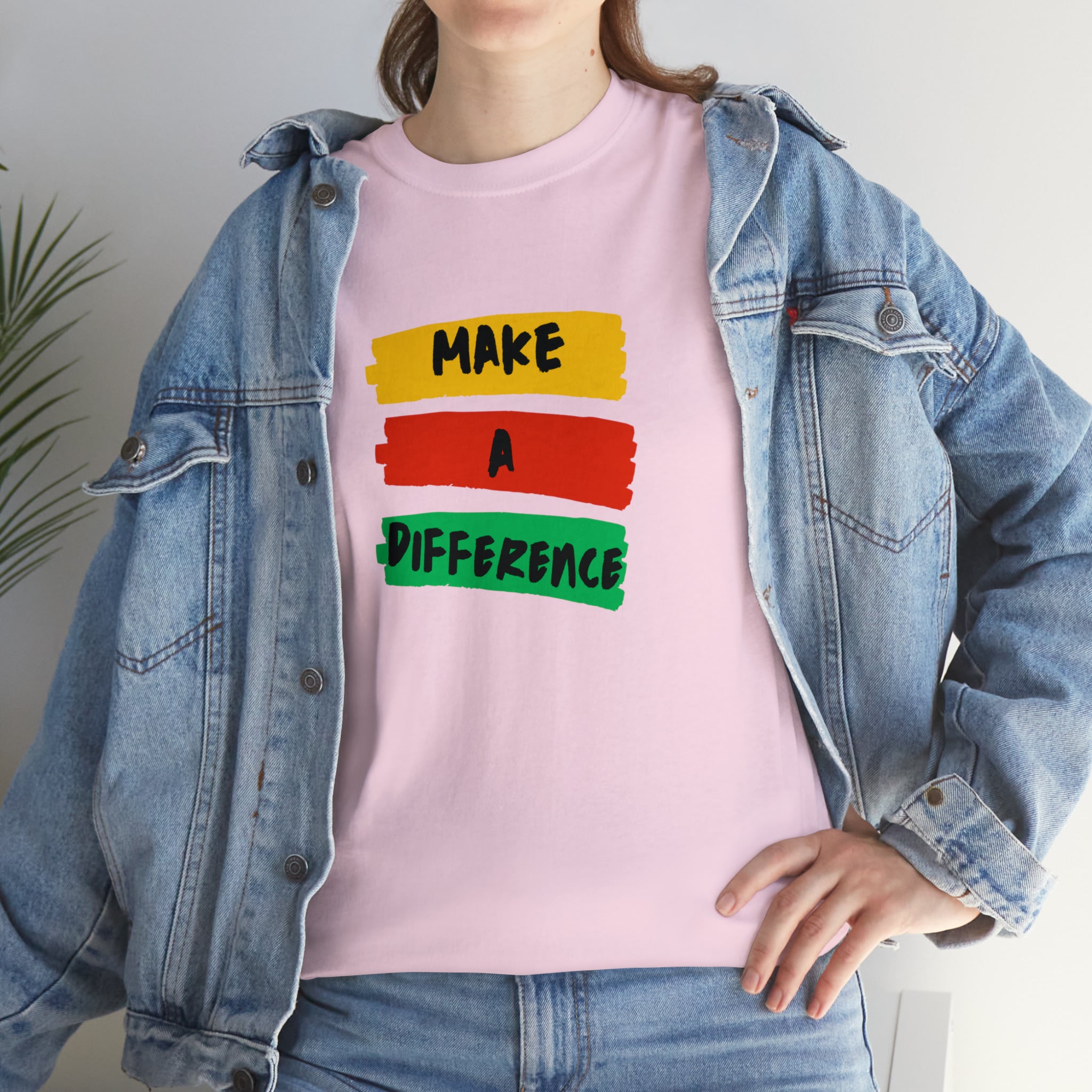 Adult female unisex light pink T-Shirt with " Make A Difference" inspired images.