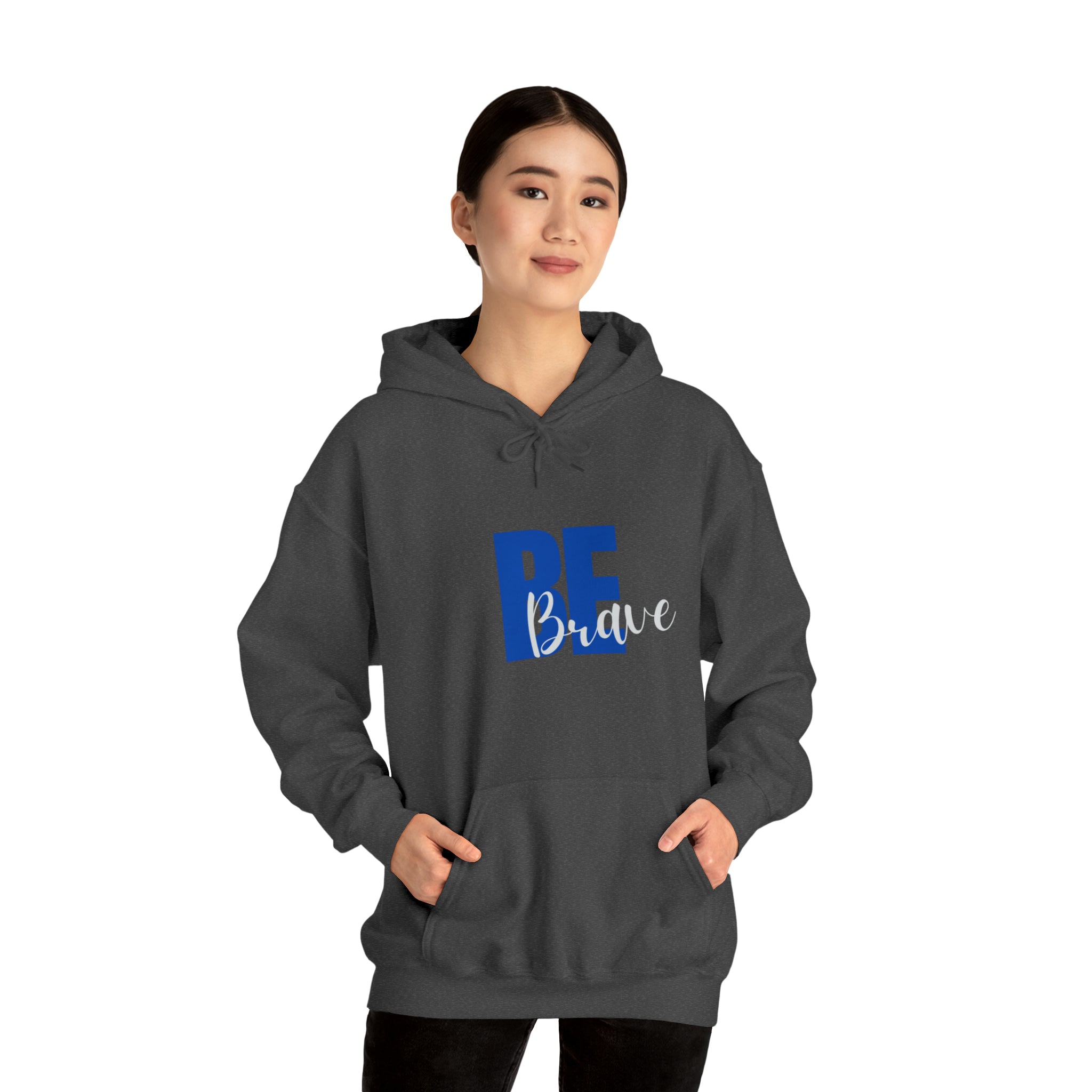 Adult Women wearing dark heather  hoodie with "Be Brave" motivational image on front.