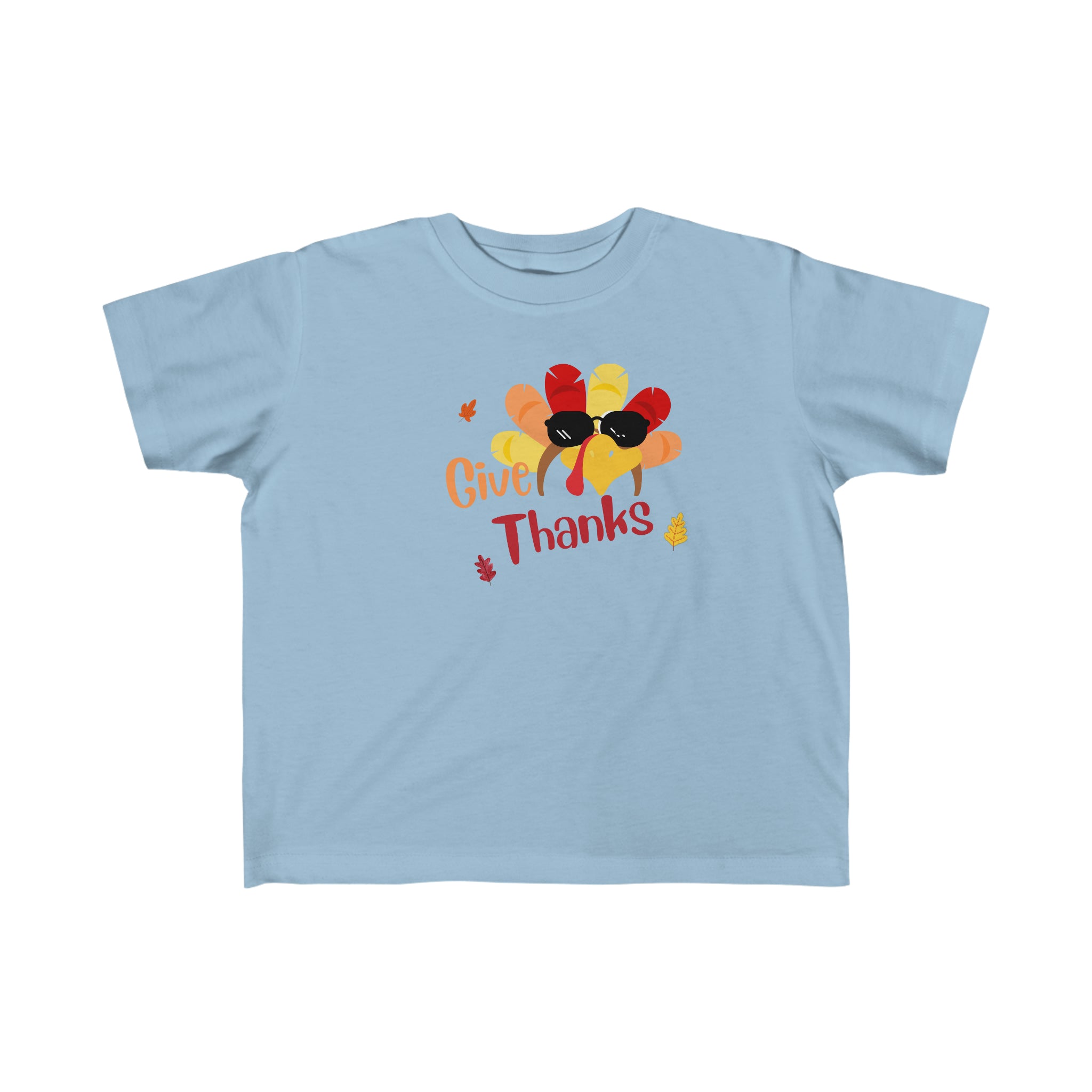 Toddler unisex wearing light blue T-Shirt " Give Thanks" with Turkey head on front.