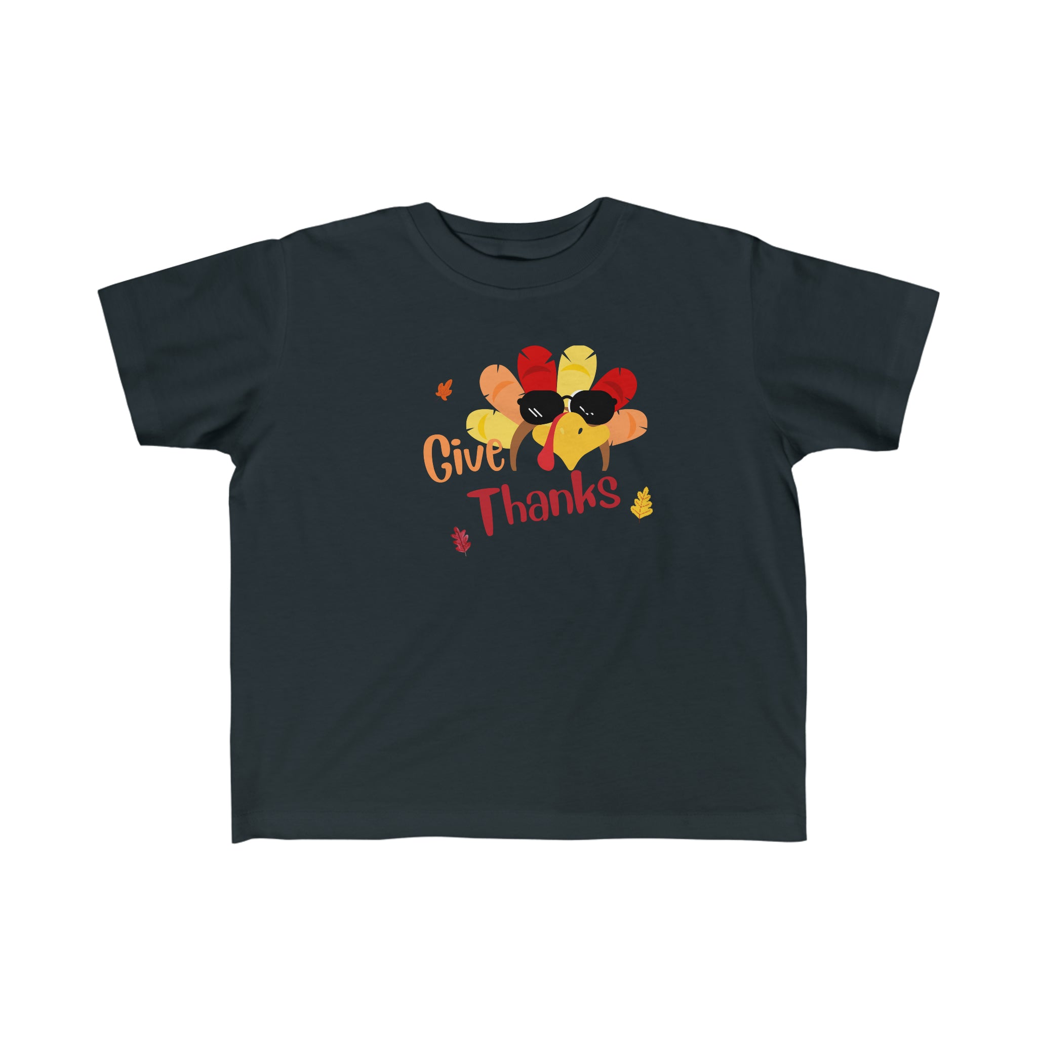 Toddler unisex wearing black T-Shirt " Give Thanks" with Turkey head on front.