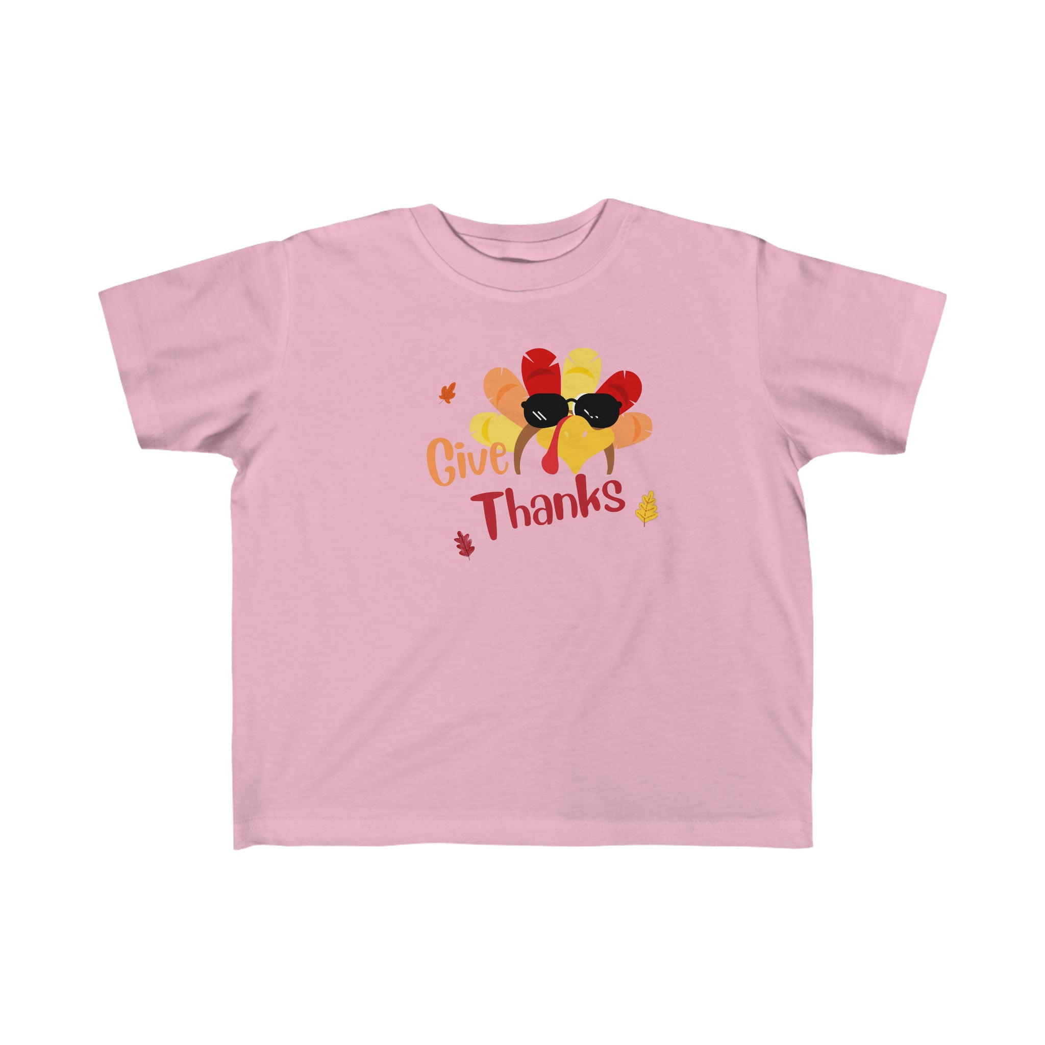 Toddler unisex wearing pink  T-Shirt " Give Thanks" with Turkey head on front.