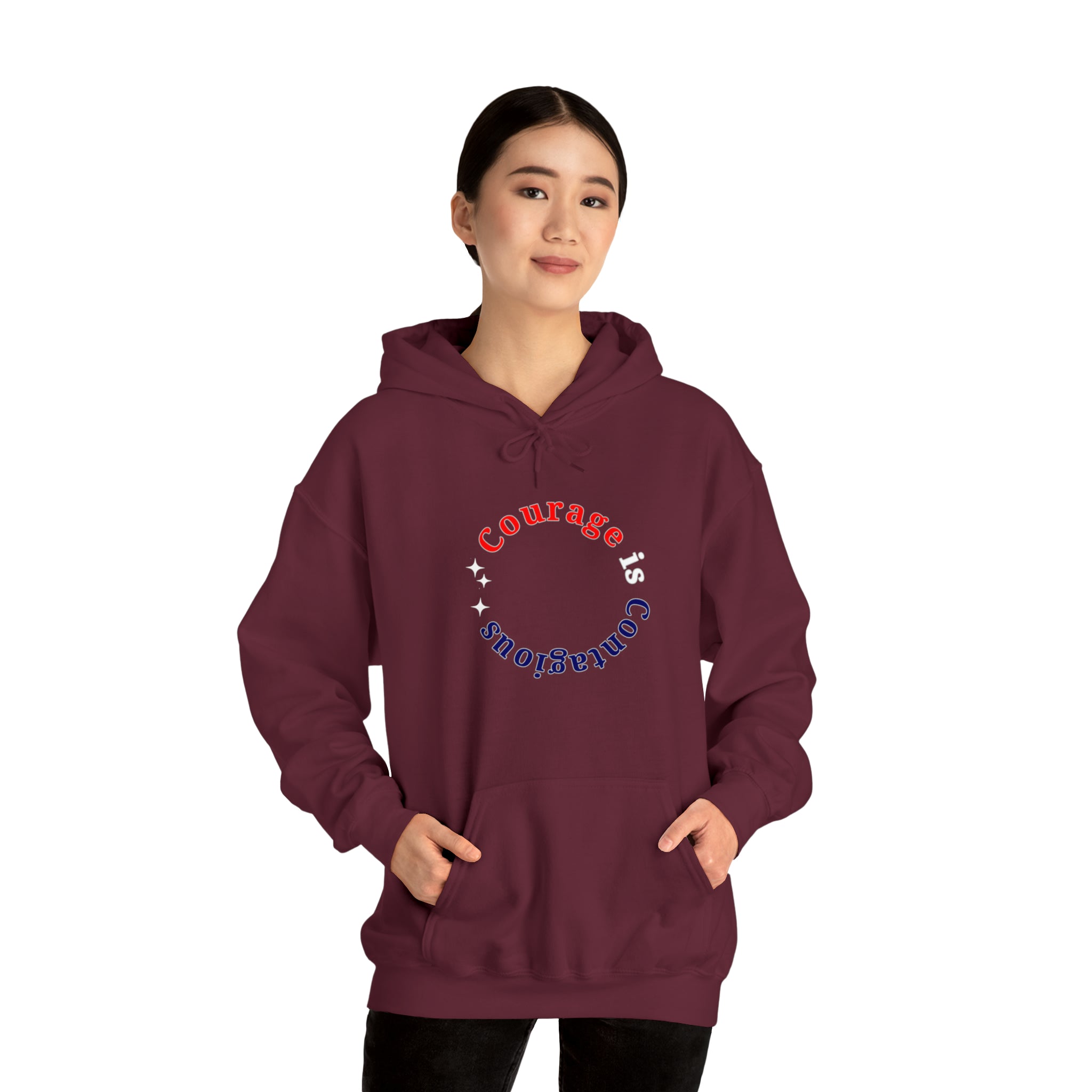 Adult Women wearing maroon hoodie " Courage is Contagious" inspired message on front.