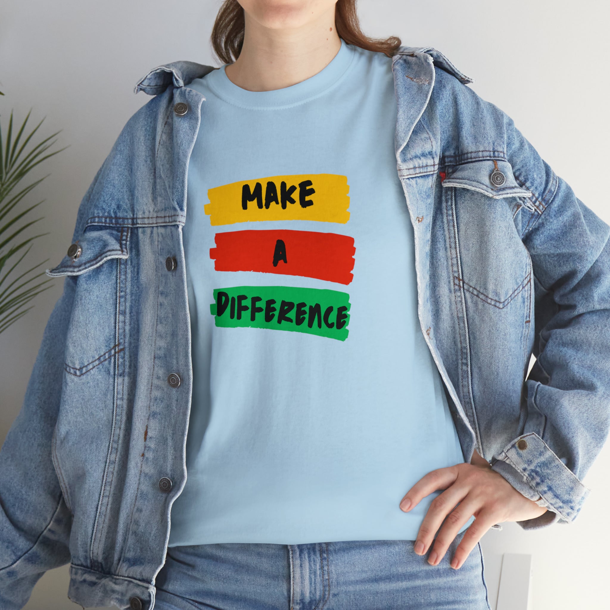 Adult female unisex light blue T-Shirt with " Make A Difference" inspired images.