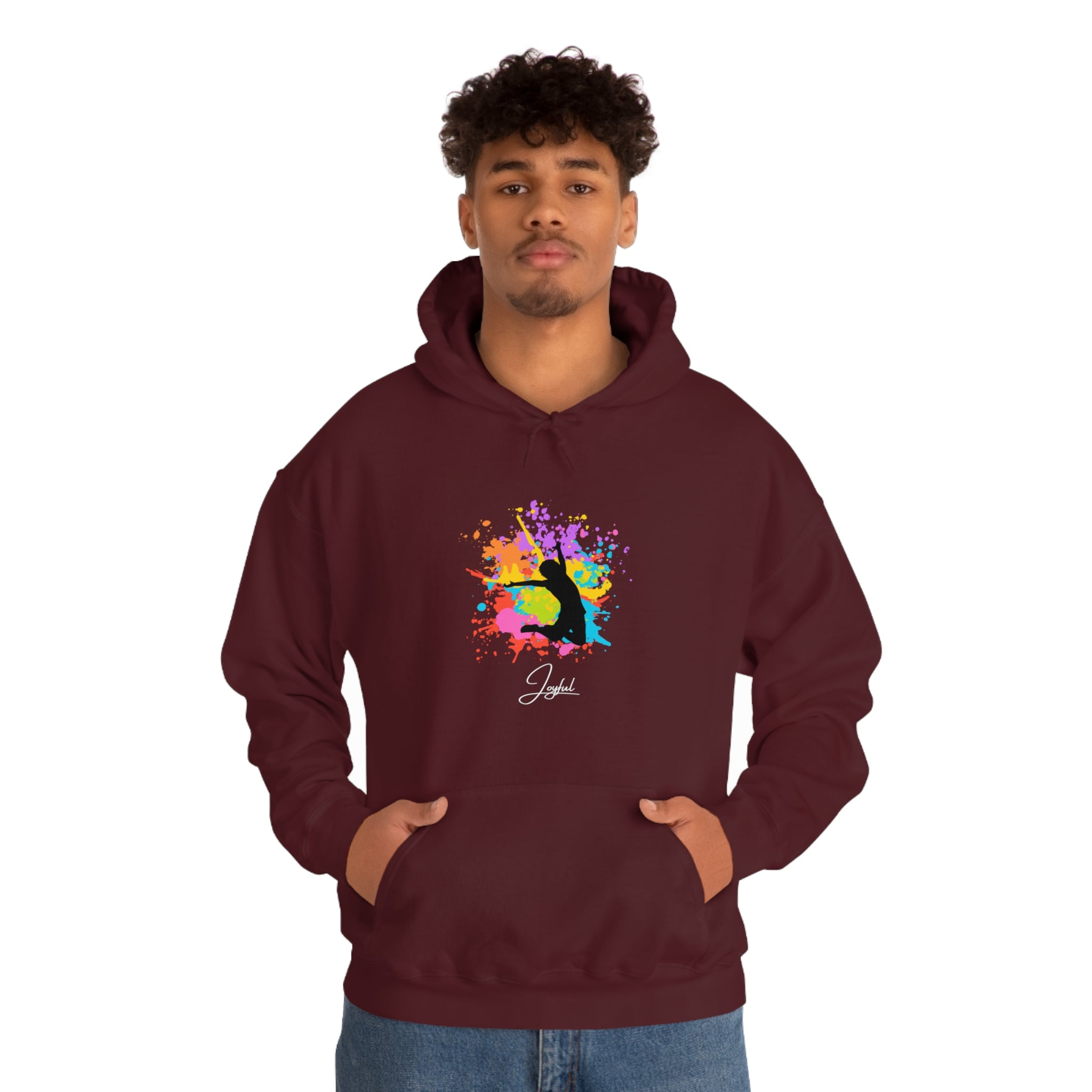 Adult male wearing maroon hoodie with "Joyful" image on front
