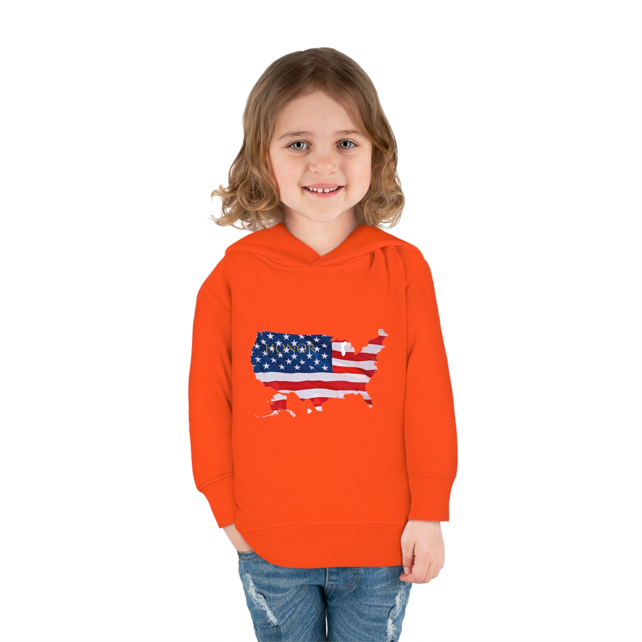 Toddler Girl wearing orange Hoodie with "Honor USA" inspired American as a Flag graphic on front.