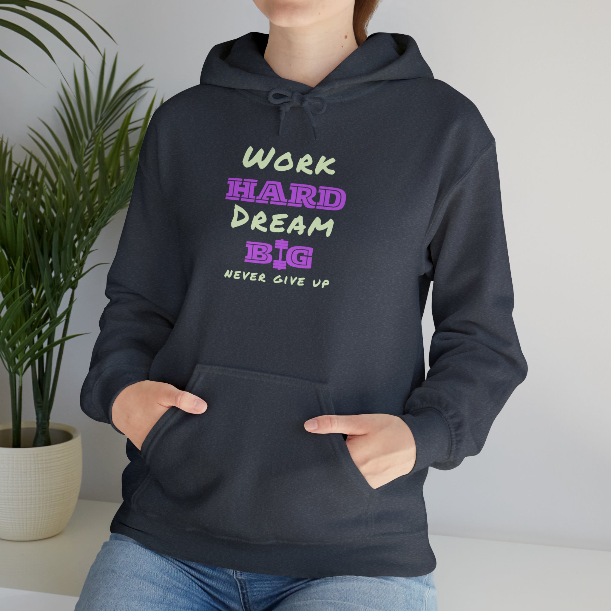 Adult Model wearing dark heather hoodie with Work Hard Dream Big Never Give Up Image on front.