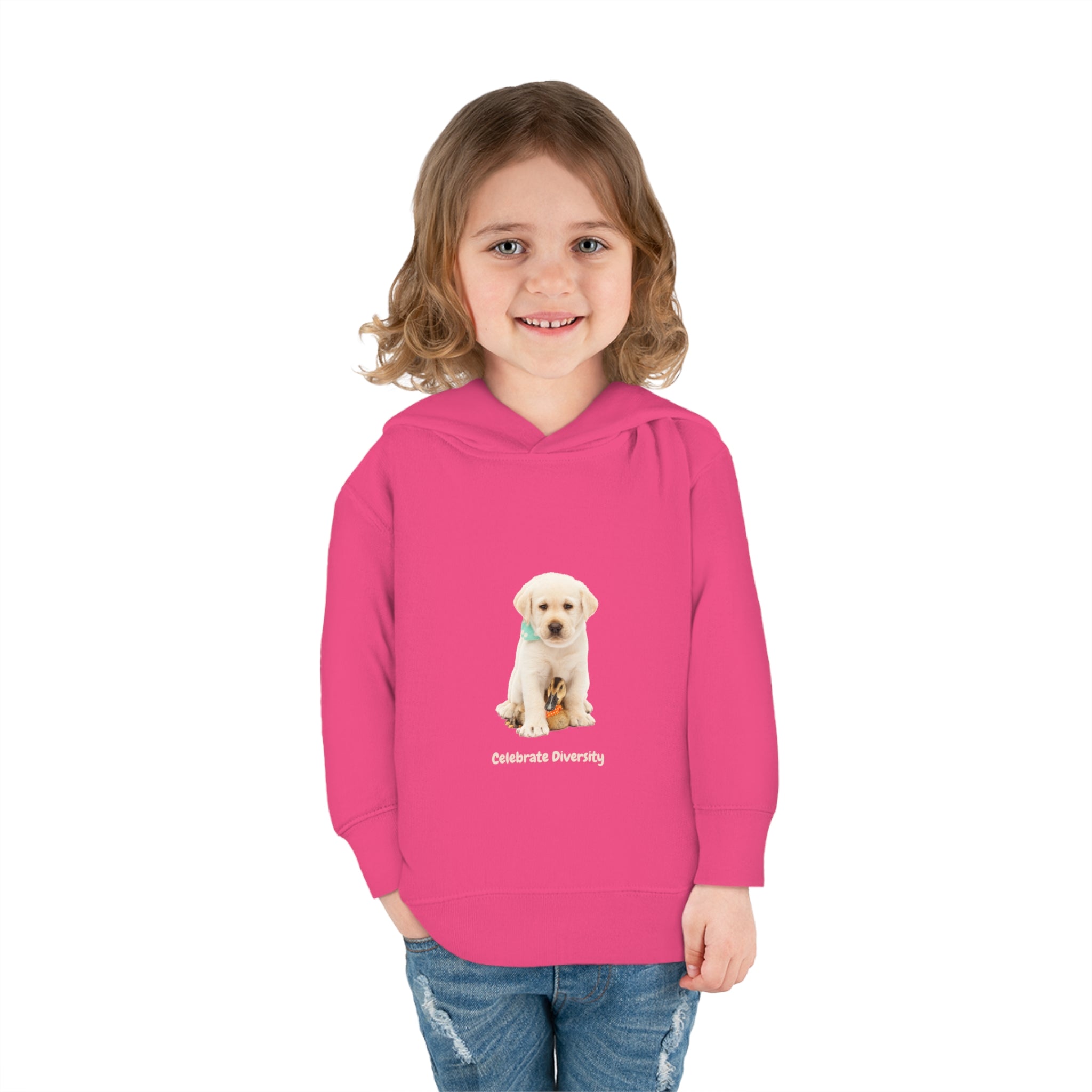 Toddler girl wearing Vintage Hot pink unisex hoodie with "Celebrate Diversity" inspired graphic with puppy and duck on front.