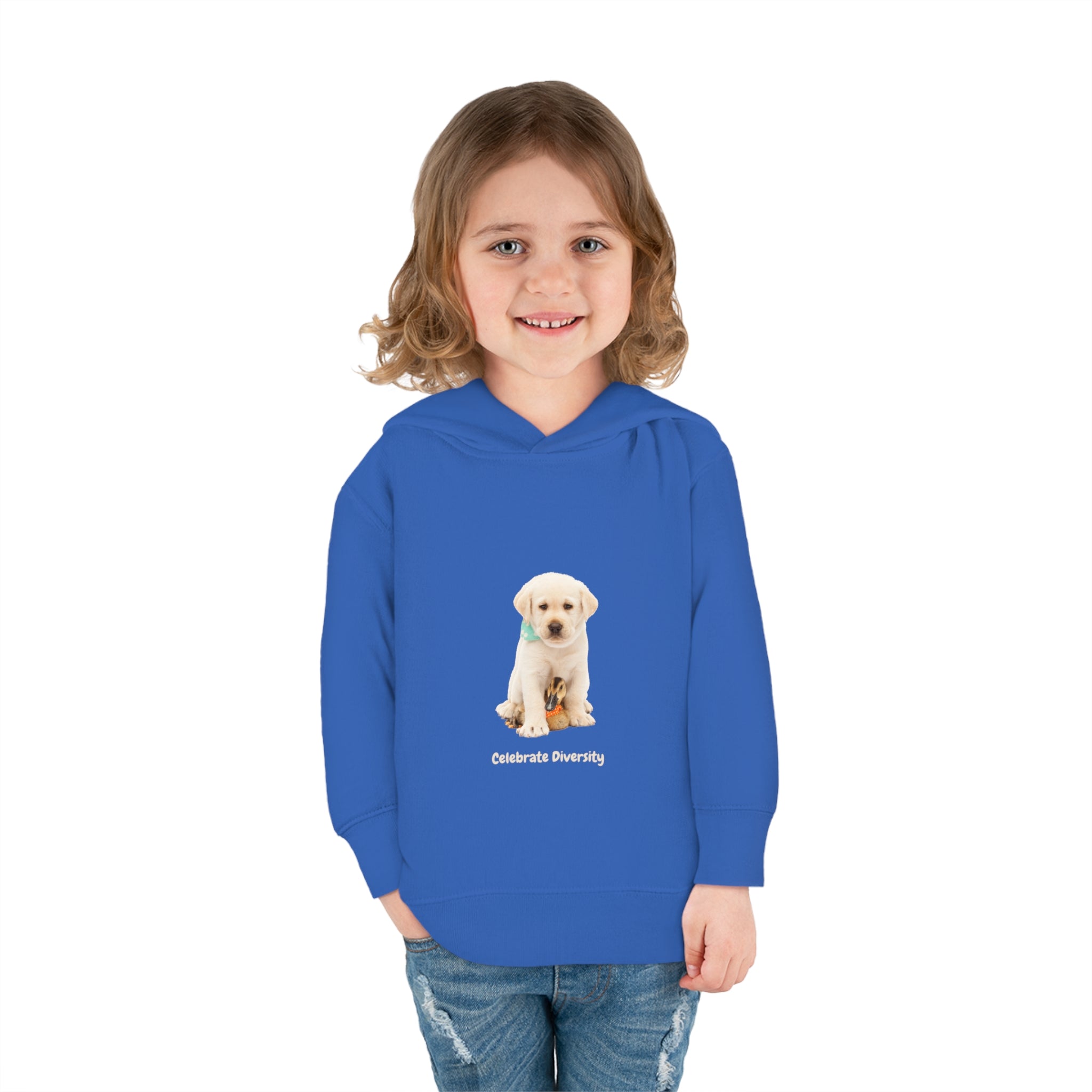 Toddler girl wearing Vintage Royal unisex hoodie with "Celebrate Diversity" inspired graphic with puppy and duck on front.