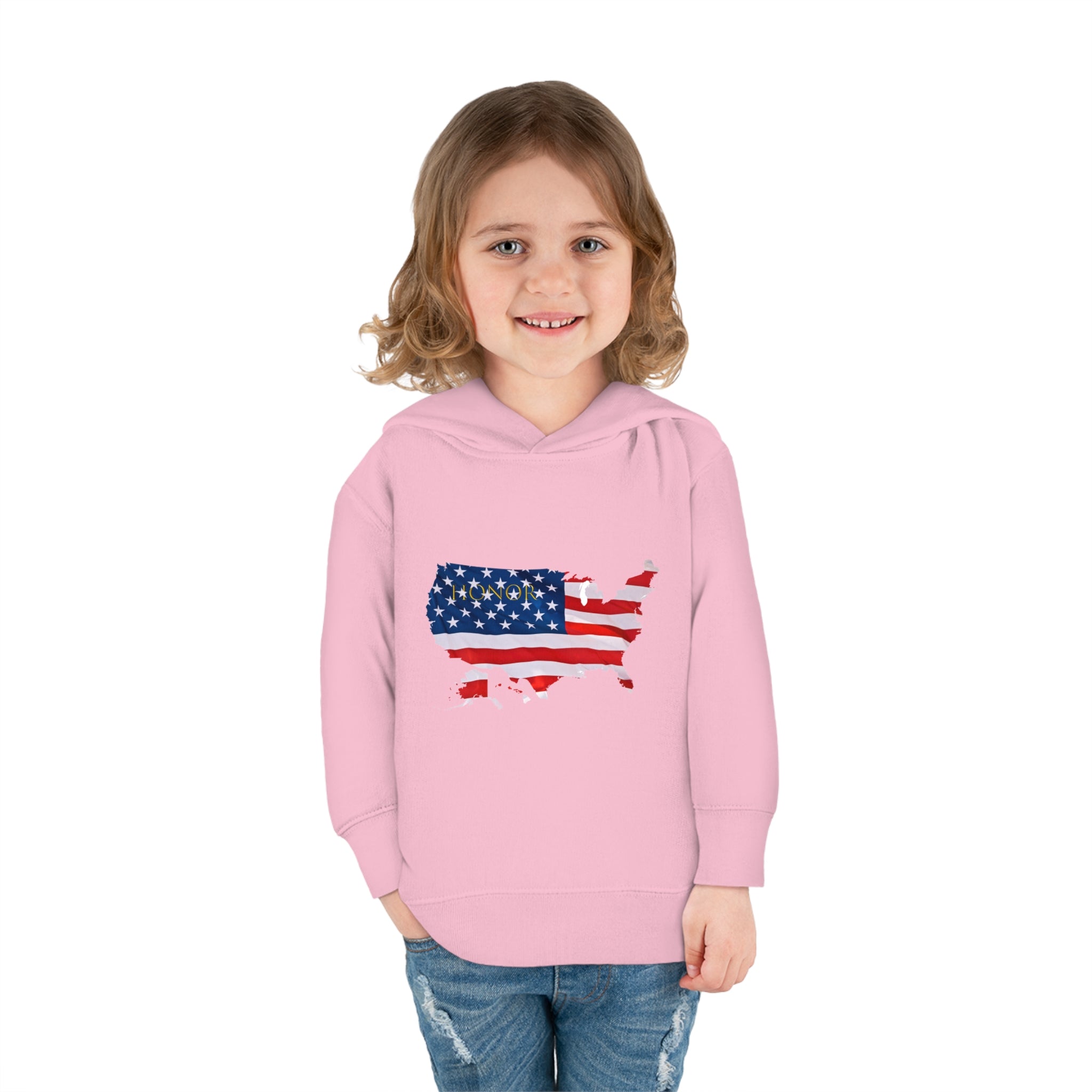 Toddler Girl wearing light pink Hoodie with "Honor USA" inspired American as a Flag graphic on front.