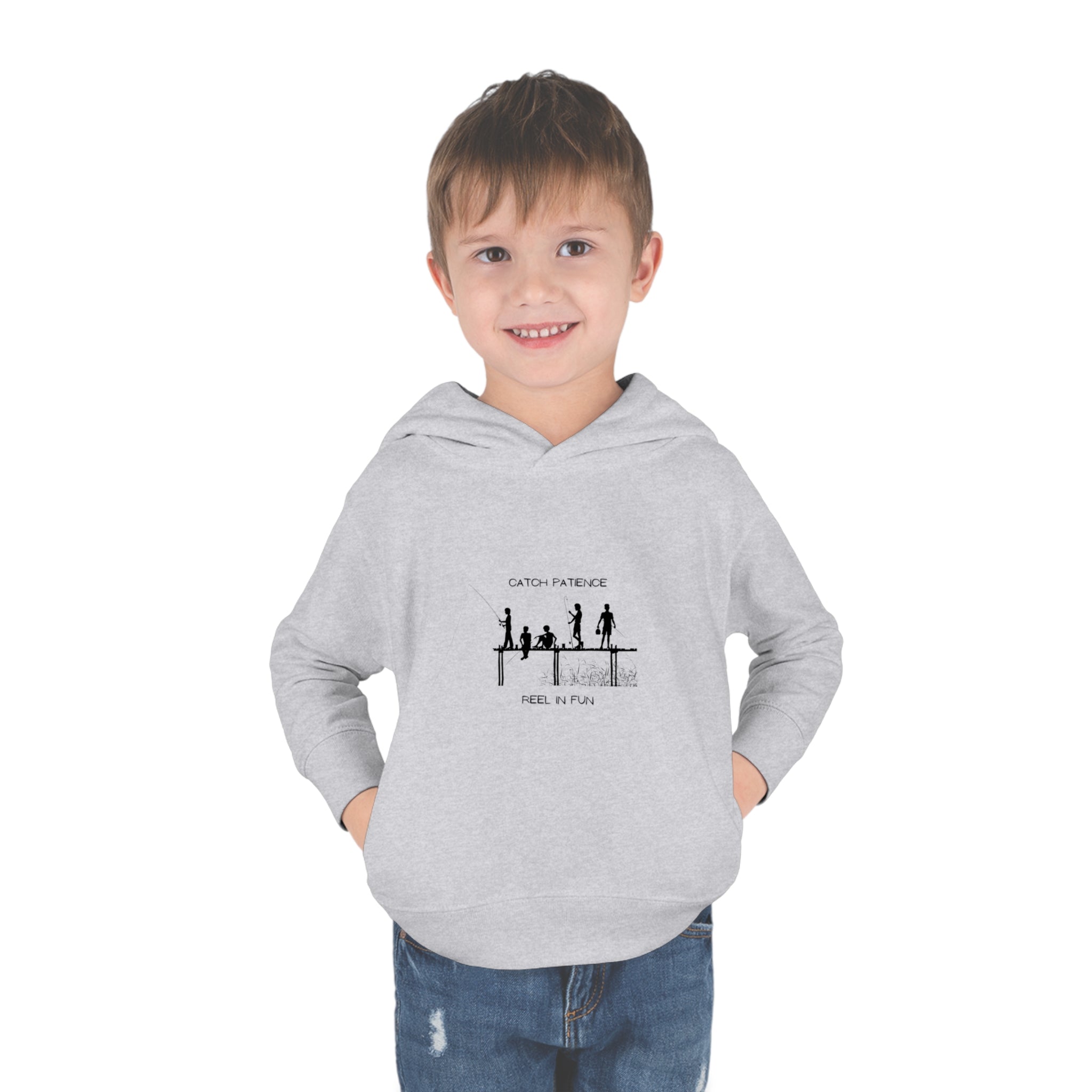 Boy Toddler unisex wearing Sport grey hoodie with "Catch Patience Reel in Fun" inspired graphic of people fishing.