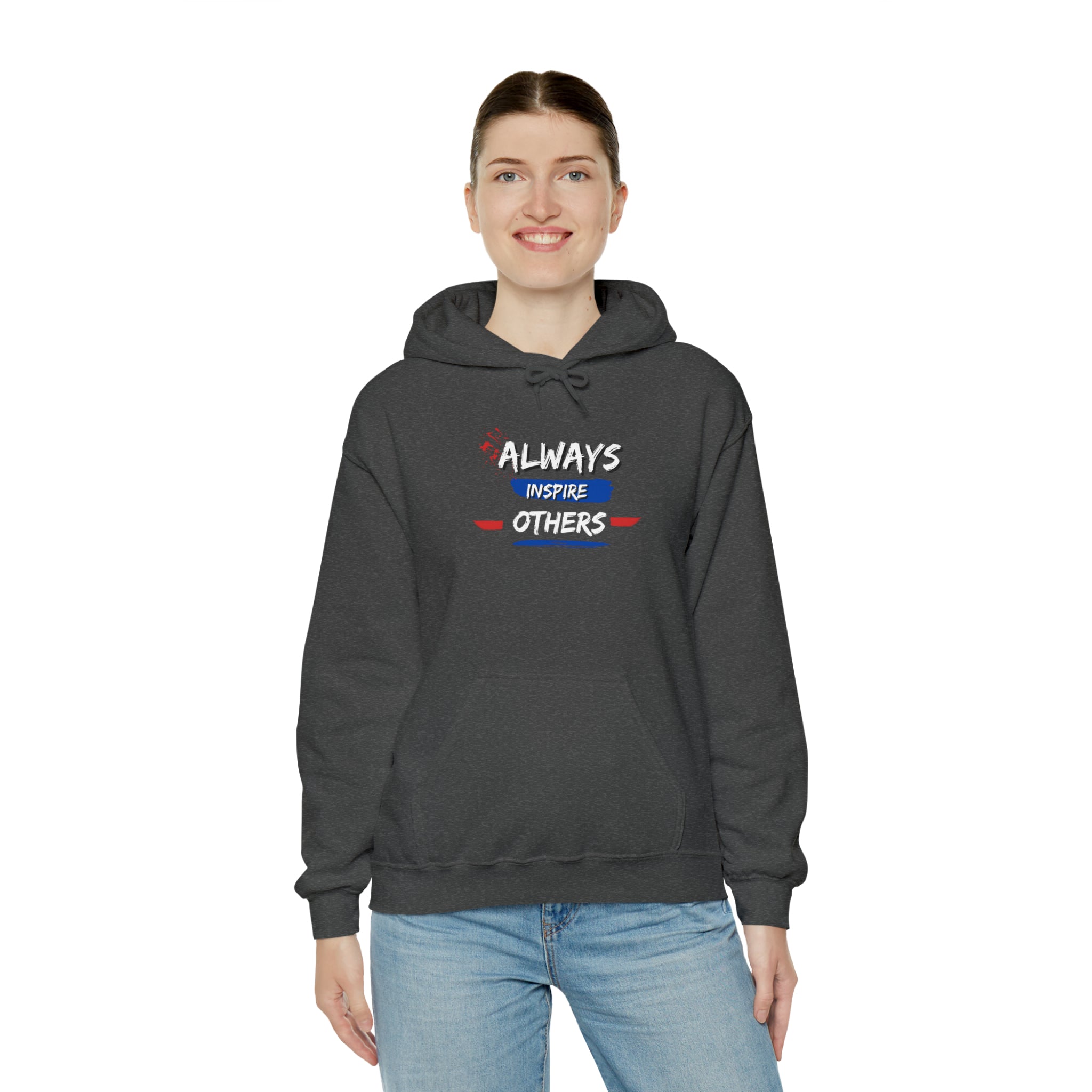 Adult female wearing grey hoodie with "Always Inspire Others"ational image on front.