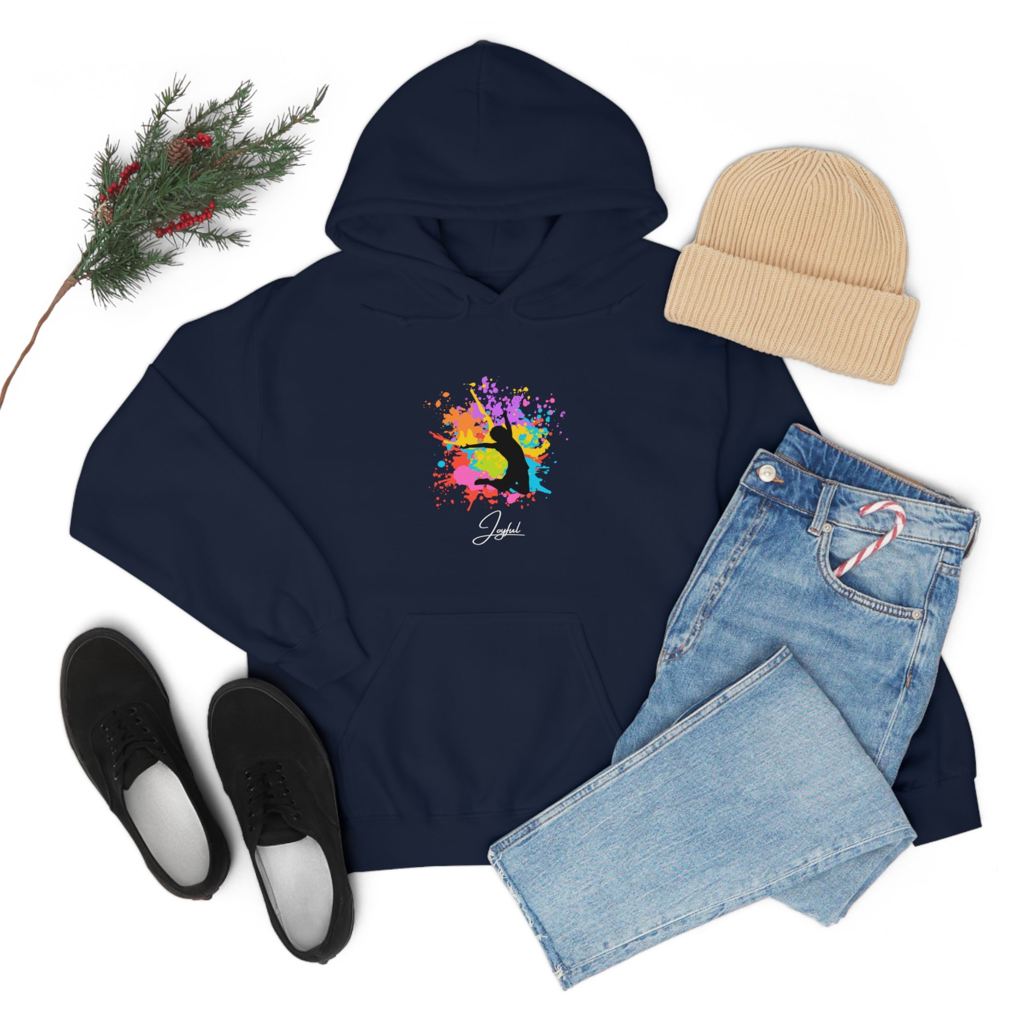 Adult outfit display with navy hoodie with "Joyful " graphic on front, black shoes, blue jeans, tan hat .