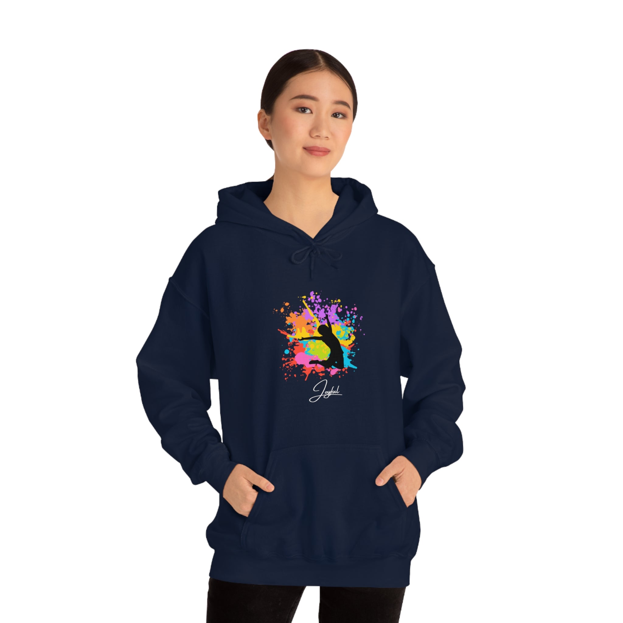 Adult female wearing navy hoodie with "Joyful" graphic on front.