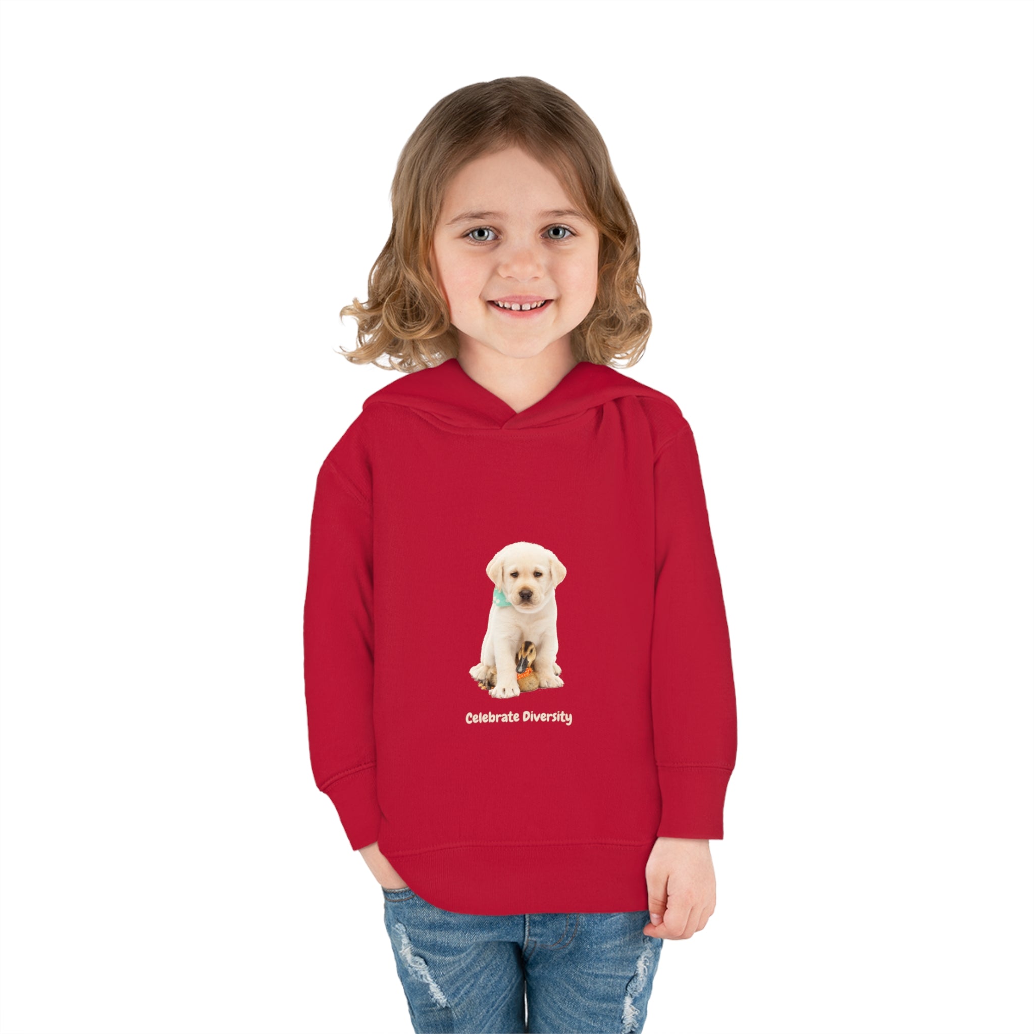Toddler girl wearing Vintage red unisex hoodie with "Celebrate Diversity" inspired graphic with puppy and duck on front.