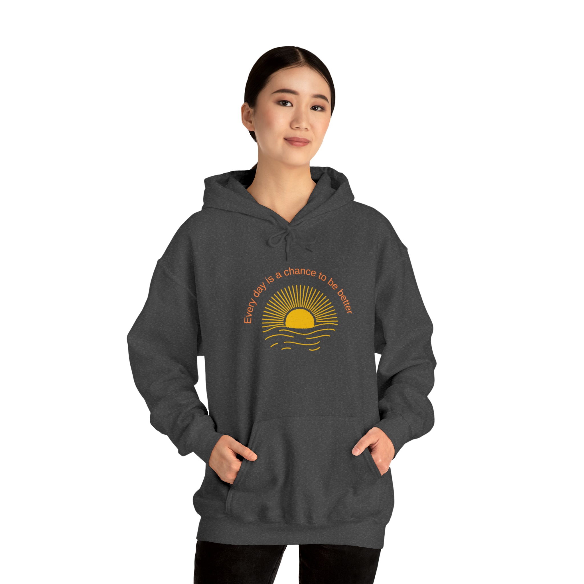 Adult Female Model wearing Dark Heather Hoodie with Every Day is a chance to be better with Sunshine image on front.