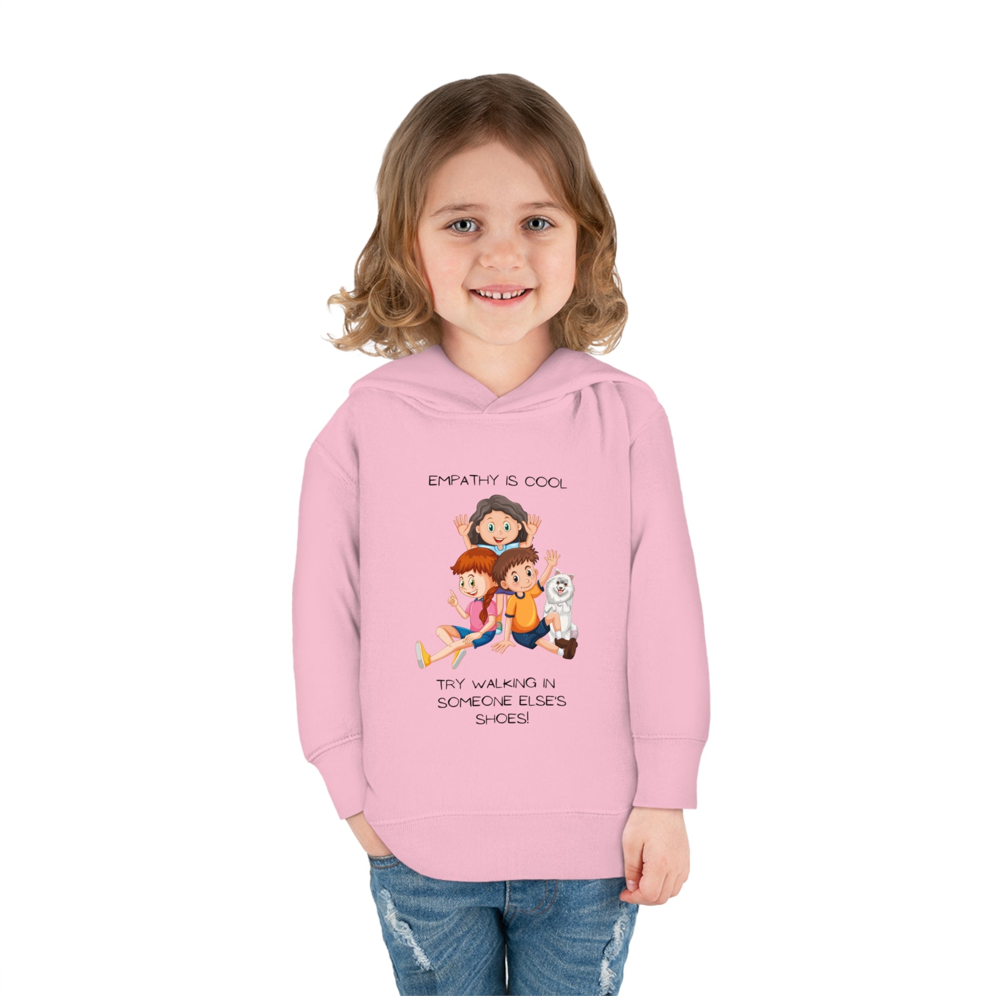Toddler girl wearing light pink hoodie " Empathy Is Cool Try Walking In Someone Else's Shoes" Inspired message on front.