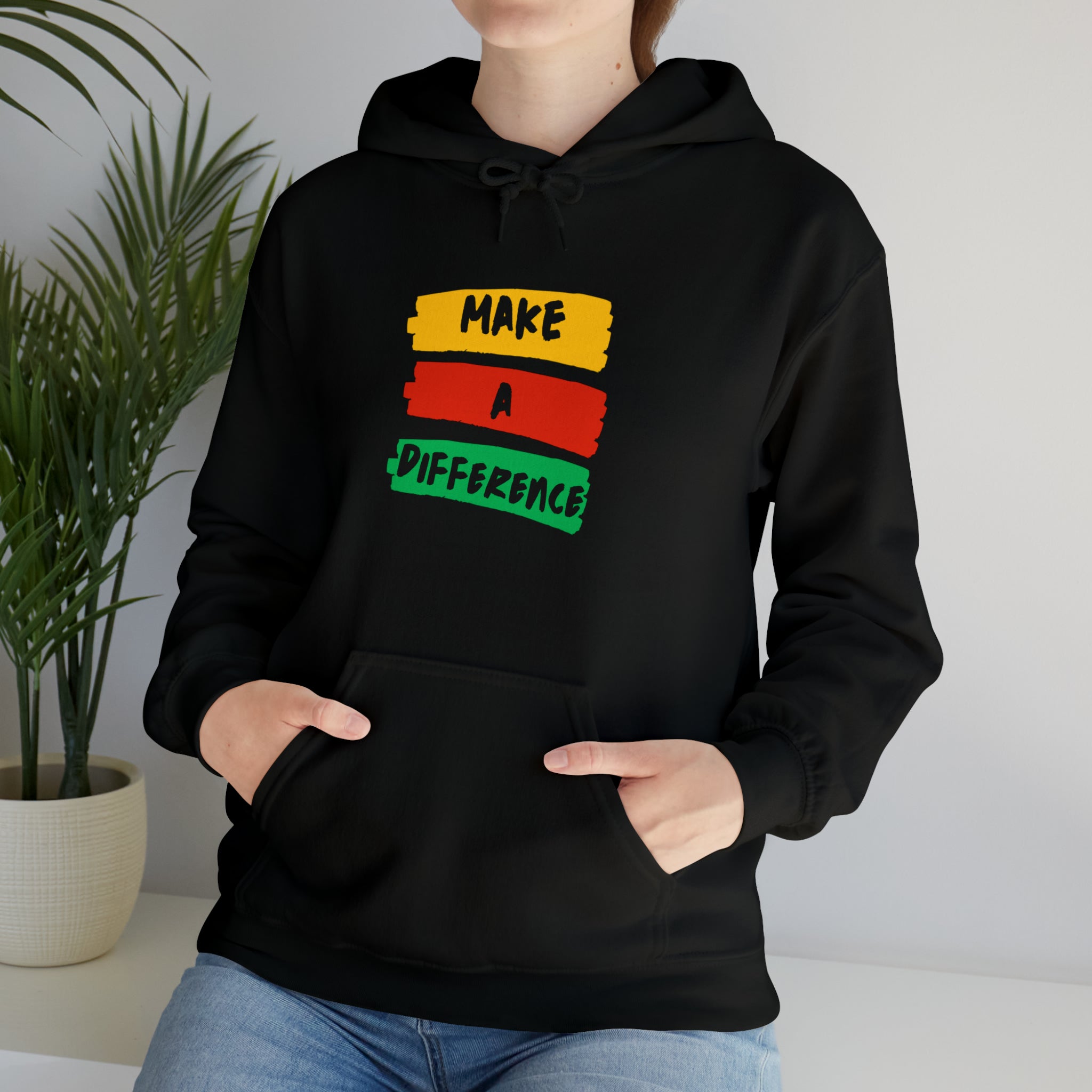 Adult female wearing black hoodie " Make A Difference" inspired images.