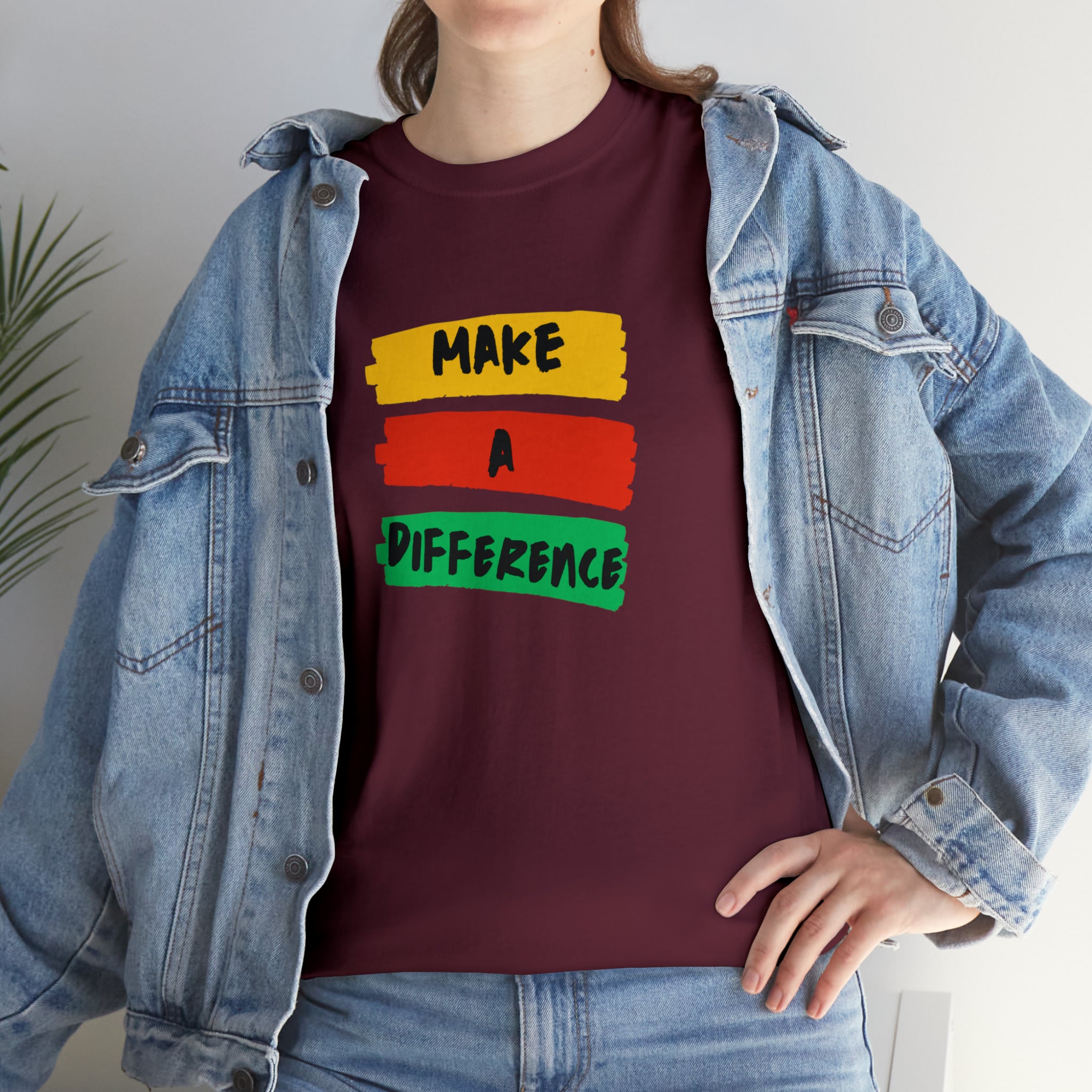 Adult female unisex maroon T-Shirt with " Make A Difference" inspired images.