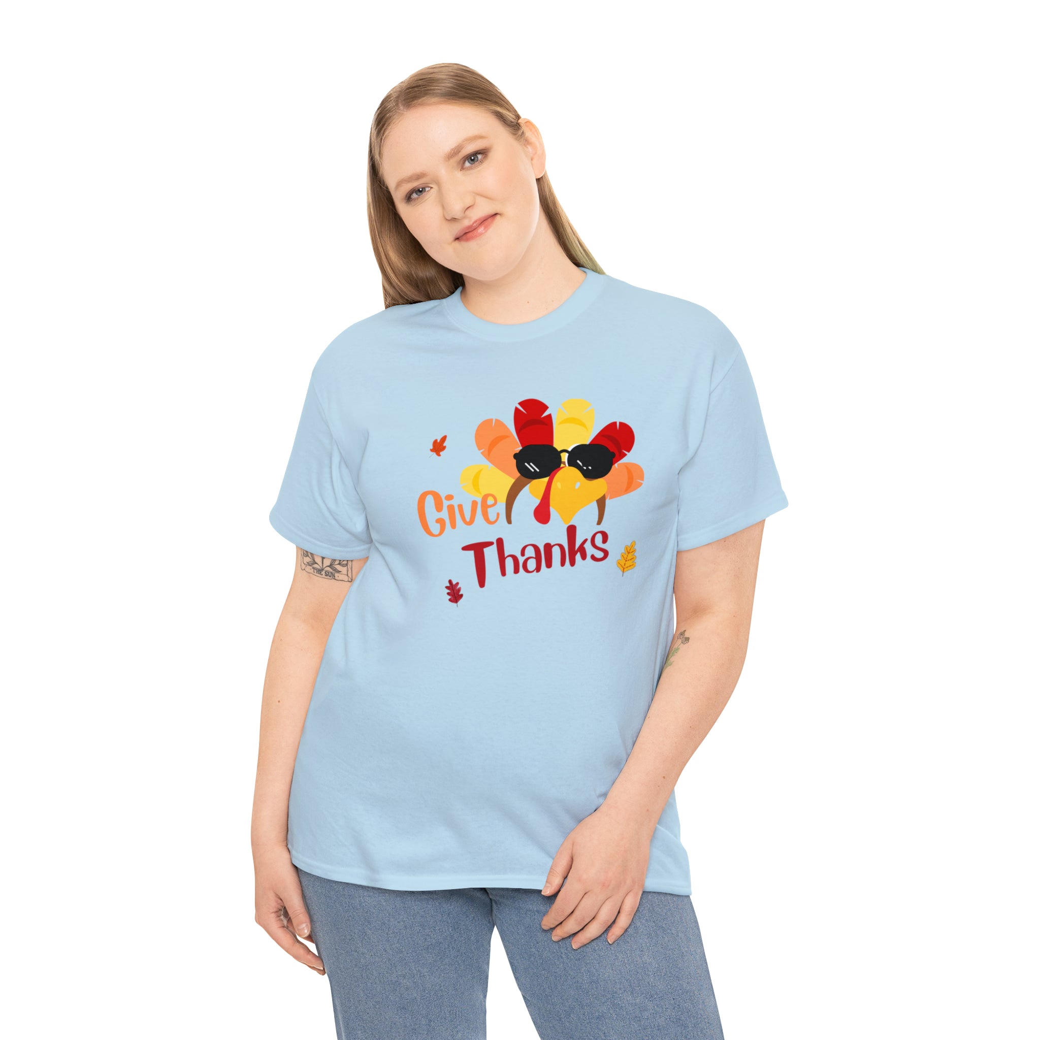 Adult women light blue T-Shirt " Give Thanks" with Turkey head on front.
