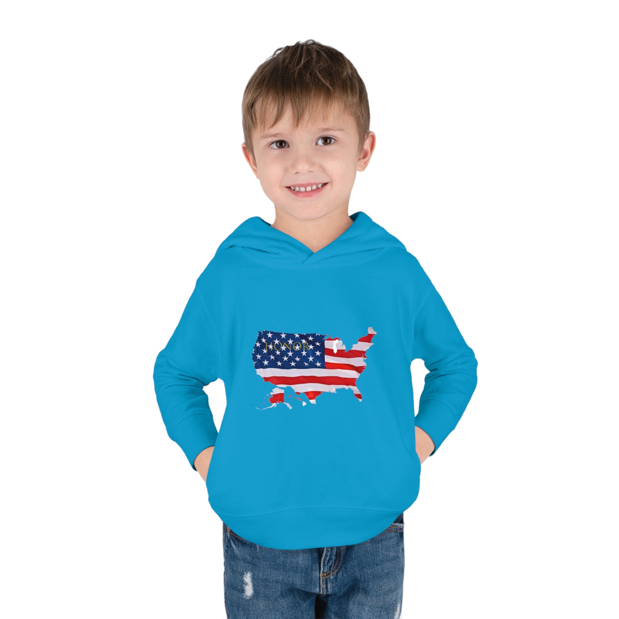 Toddler Boy wearing Carolina Blue Hoodie  with "Honor USA" inspired American as a Flag graphic on front.