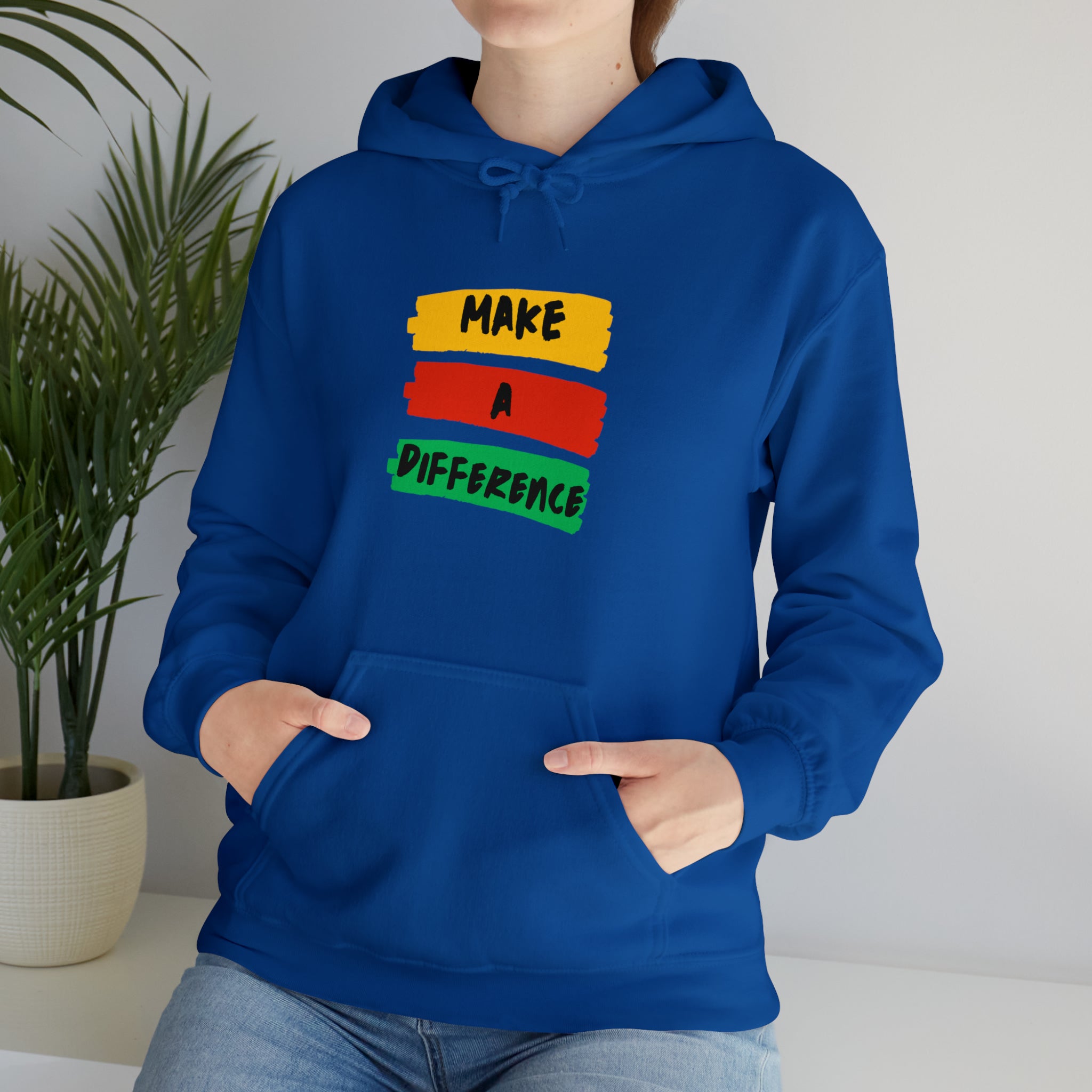 Adult female wearing royal  hoodie " Make A Difference" inspired images.
