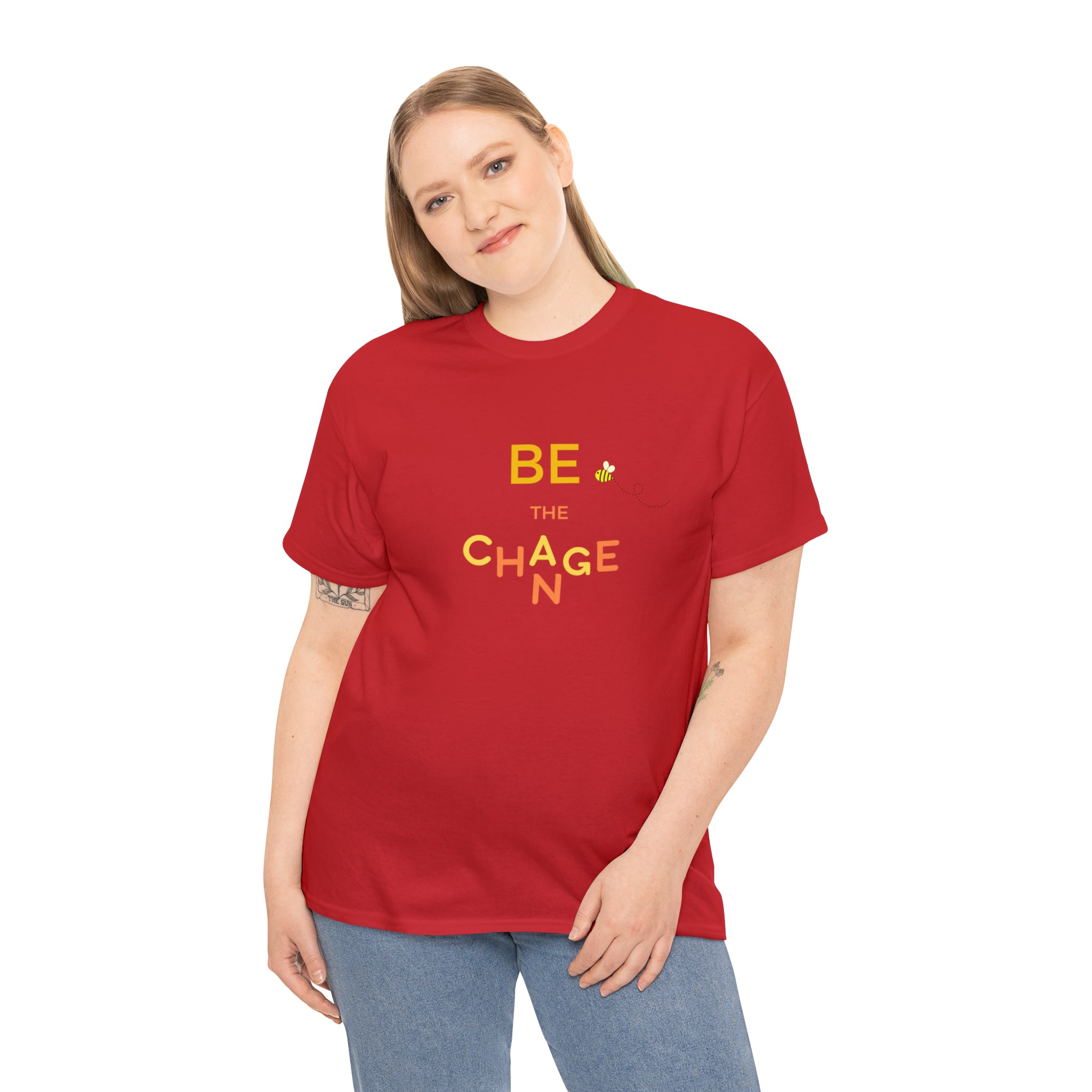 Adult Women wearing red T-Shirt with "Be The Change" motivational image on front.