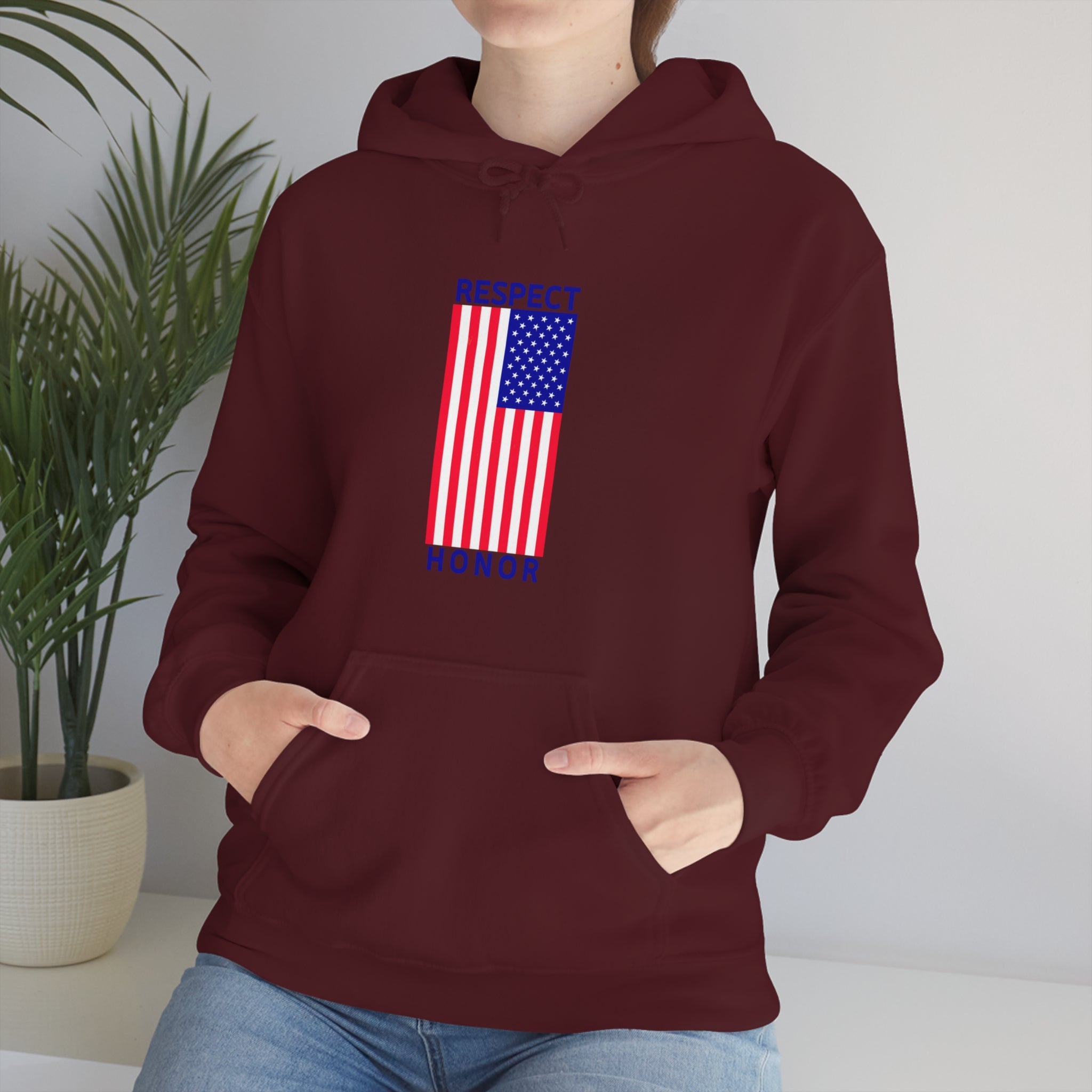 Adult female front view wearing maroon hoodie with "Respect Honor" Inspired Classic American Flag on front.