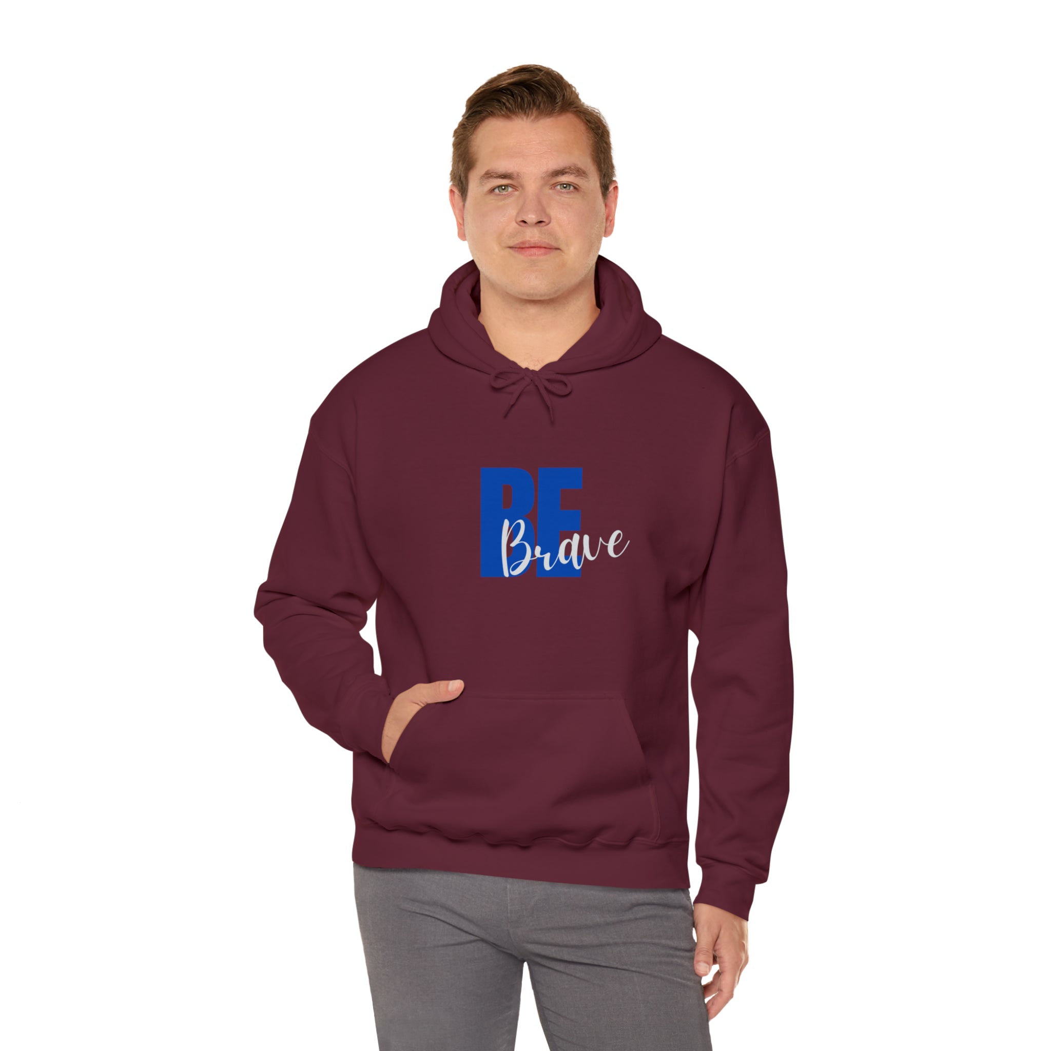 Adult man wearing maroon hoodie with "Be Brave" motivational image on front.