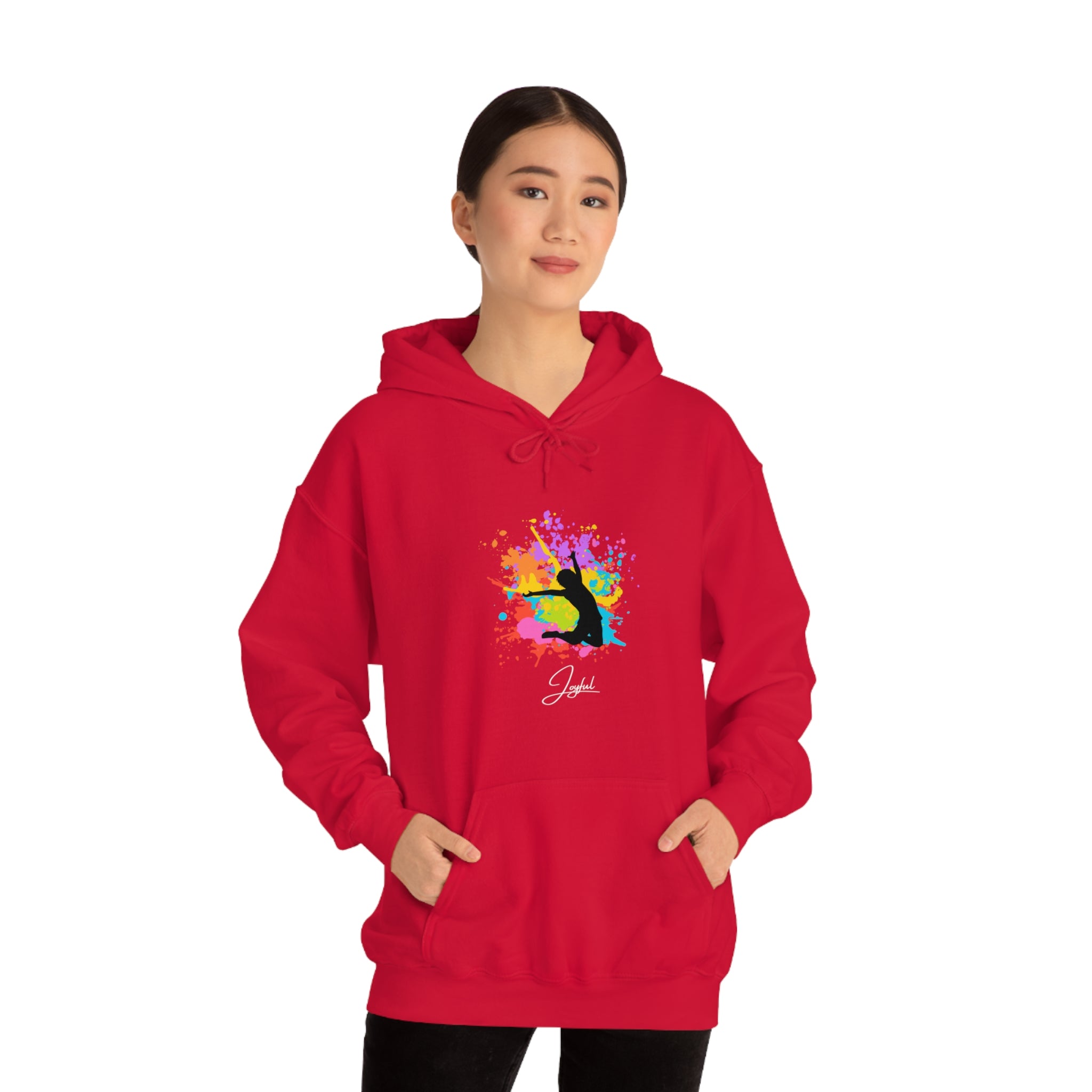 Adult female wearing Red hoodie with "Joyful" graphic on front.