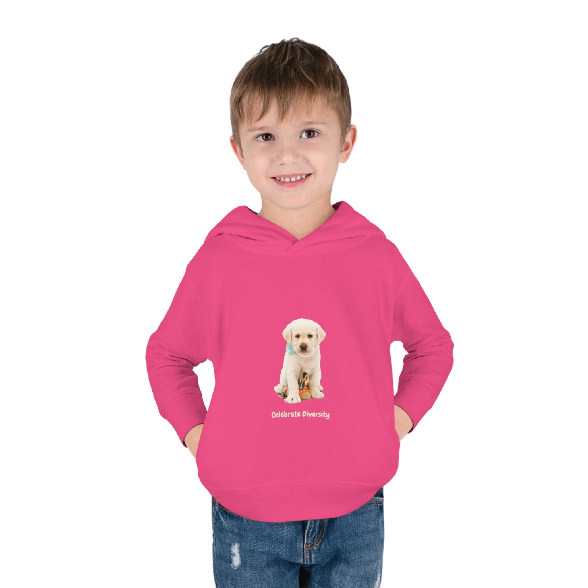 Toddler boy wearing vintage hot pink unisex hoodie with "Celebrate Diversity" inspired graphic with puppy and duck on front.