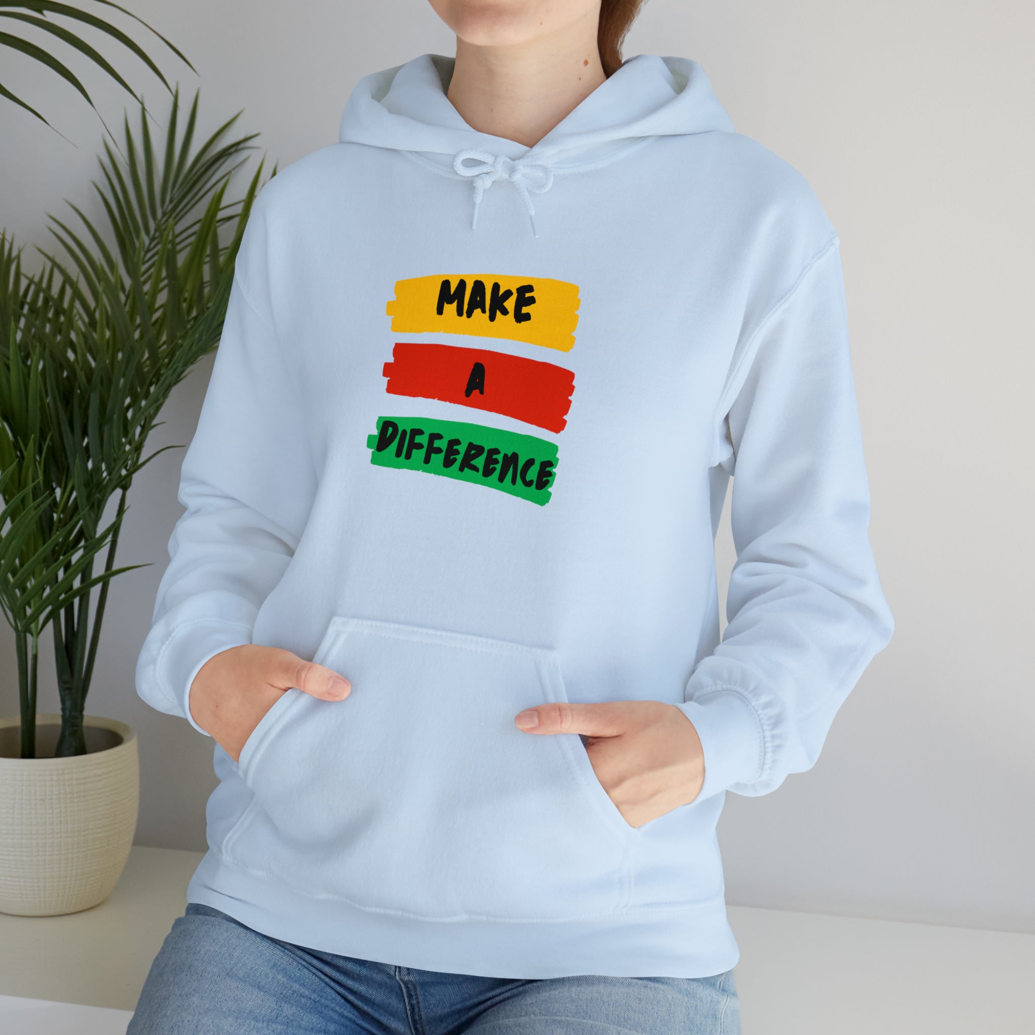 Adult female wearing light blue  hoodie " Make A Difference" inspired images.