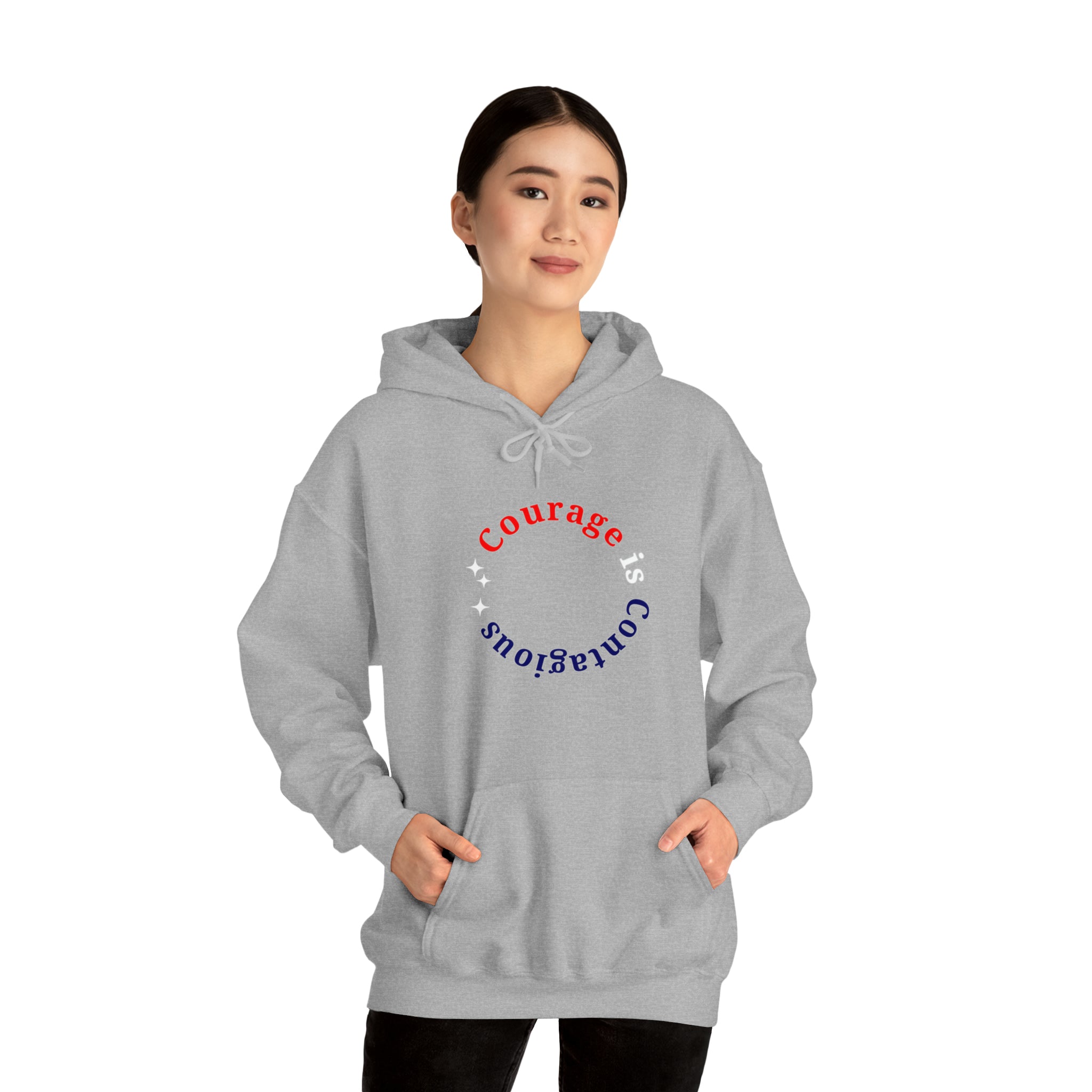 Adult Women wearing sports grey hoodie " Courage is Contagious" inspired message on front.