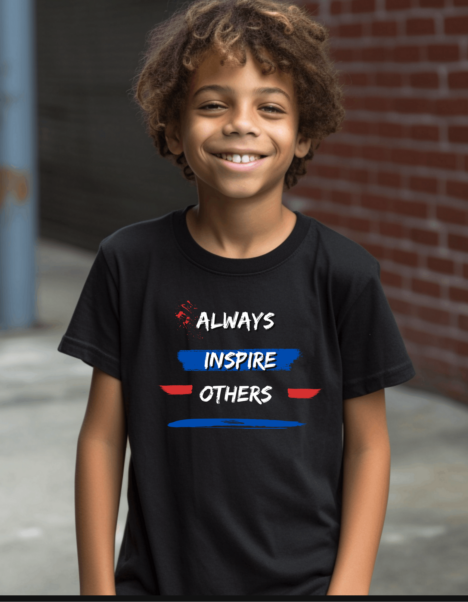 Boy wearing black T-Shirt with "Always Inspire Others" motivational image on front.